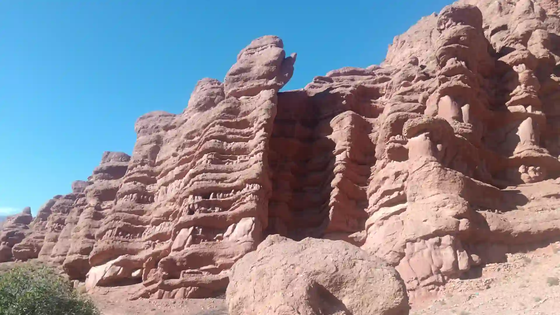 Wind-sculpted rock canyon walls in Southern Morocco