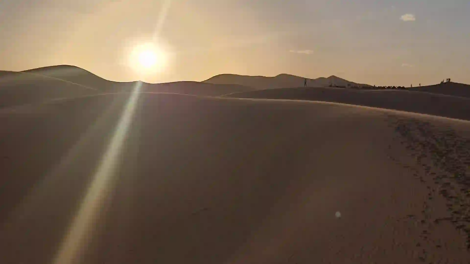 Sun rising over the Sahara dunes